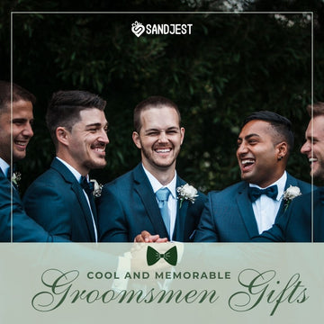 Groomsmen team smiling together, showcasing their unique and thoughtful groomsmen gifts, symbolizing camaraderie and celebration.