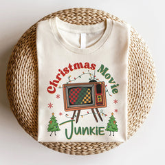 Sandjest Funny Christmas Retro Graphic Tee, Groovy Vintage Christmas Shirt, Christmas Movie Junkie Sweatshirt, Trendy Holiday Apparel Xmas Gift