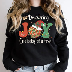 Sandjest Delivering Joy Labor and Delivery Christmas Tshirt, L&d Nurse Christmas T-Shirt, Holiday Labor Nurse Gift, Labor & Delivering Nurse T-Shirt