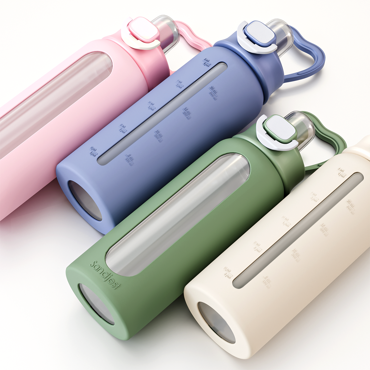 Four colorful water bottles with silicone sleeves on a white background