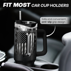 Black mug with American flag design in a car cup holder, featuring text about fit, safety, and convenience.