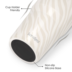 White cylindrical product with wavy pattern and black base, labeled 'Sandjest'.