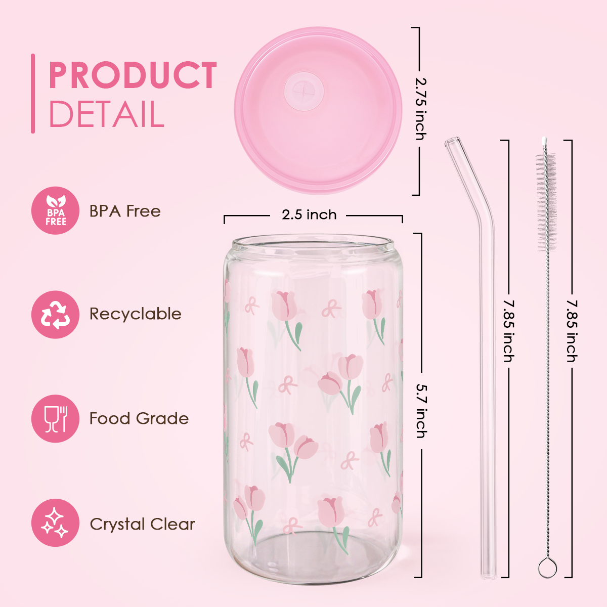A clear glass bottle with a floral pattern, accompanied by a pink bamboo lid and a clear glass straw. The bottle has a label with product details such as being BPA free, recyclable, food grade, and crystal clear.