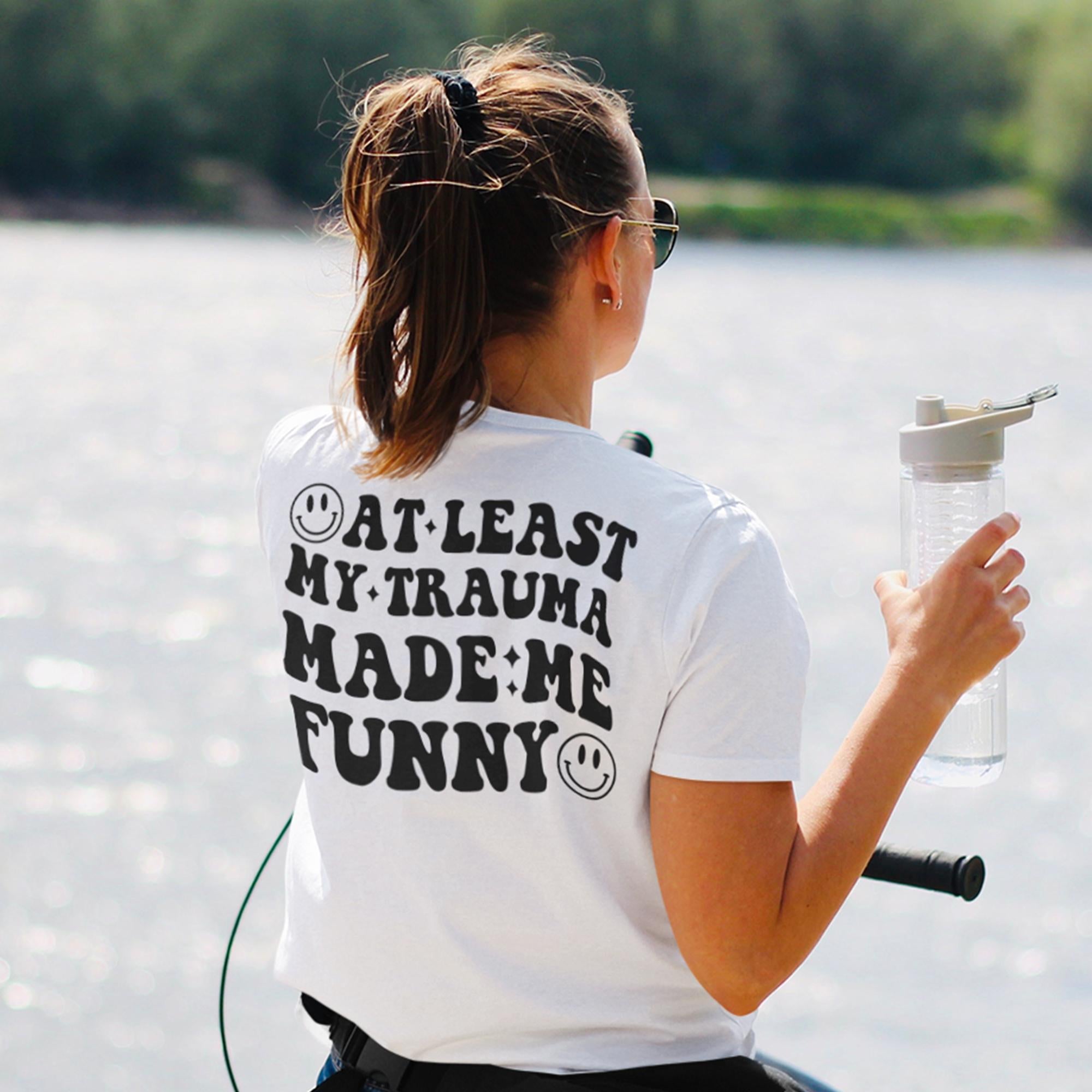 Sandjest Funny T-Shirt at Least My Trauma Made Me Funny Gift for Friend Woman Girl